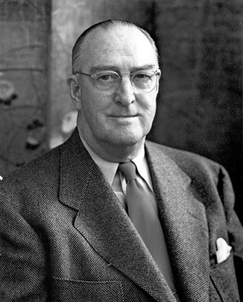 William Boeing A man with slicked-back hair wearing glasses