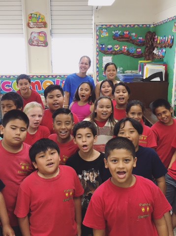 Julia with a classroom of children