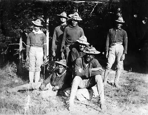 YOSE first rangers Four soldiers standing and two sitting posing for a photo in front of trees