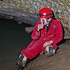 cave scientist making measurement