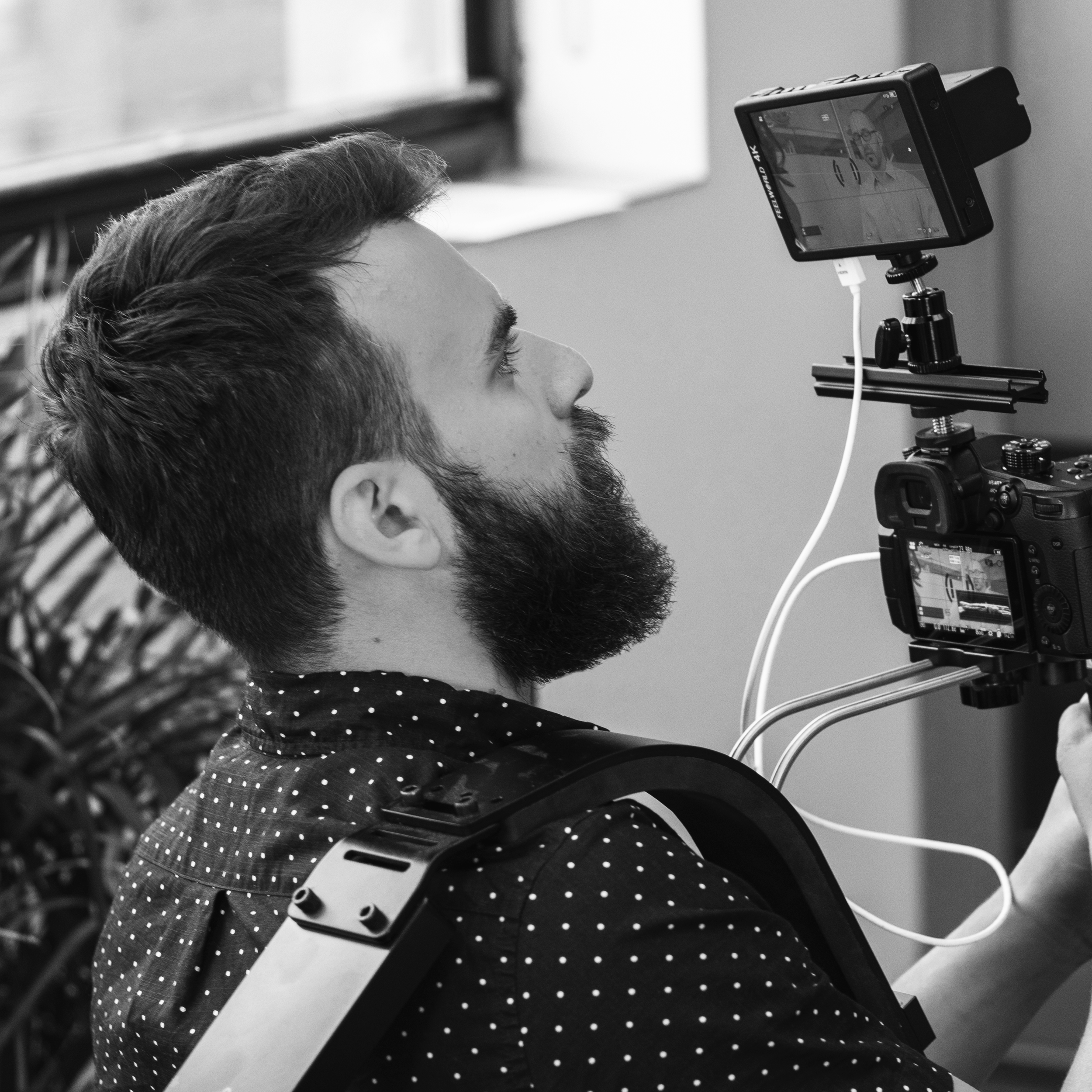 Mike+Director+Square Black and white image of Mike Mintz filming