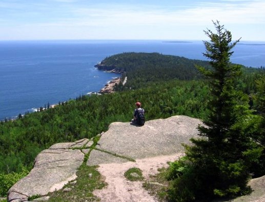 lt= Hiker overlooks Acadia National Park