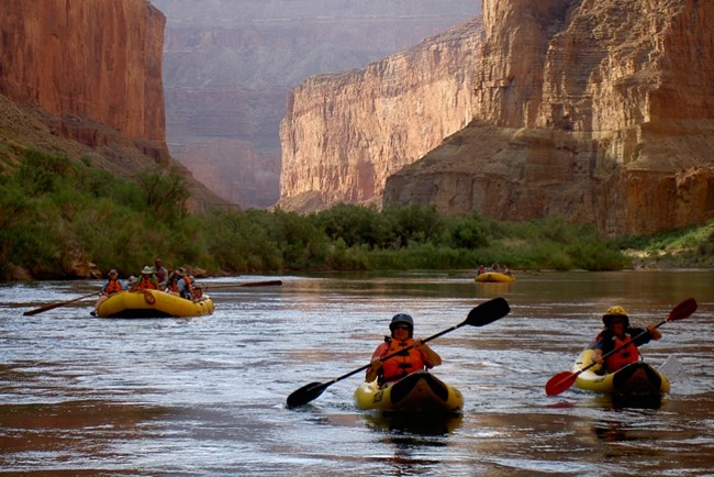 kayakers and white water rafting on a river