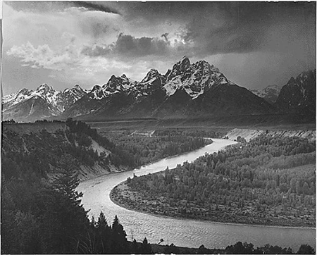 450_GRTE_SnakeRiver-GrandTetons-AnselAdams Sunlight reflects of the curving Snake River at the base of the snow-capped Grand Tetons