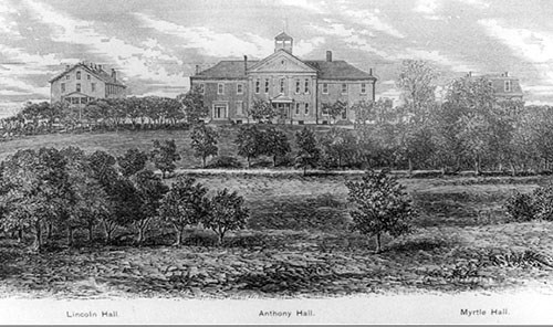 An engraving shows three buildings on the crest of a hill, with a lawn dotted with deciduous trees.