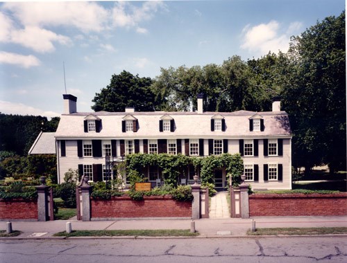 lt= Contemporary image of the Old House, a two-story home with many windows.