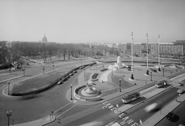 Looking down from the roof of Union Station, cars navigate around Columbus Circle.