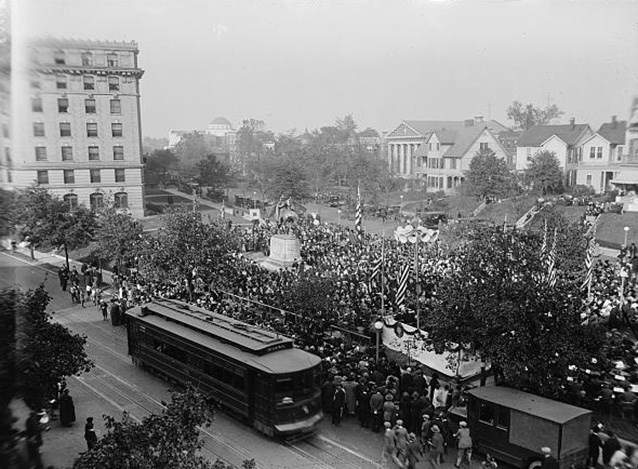In a view from above, the Asbury Memorial is surrounded by crowds of people during a patriotic celebration.