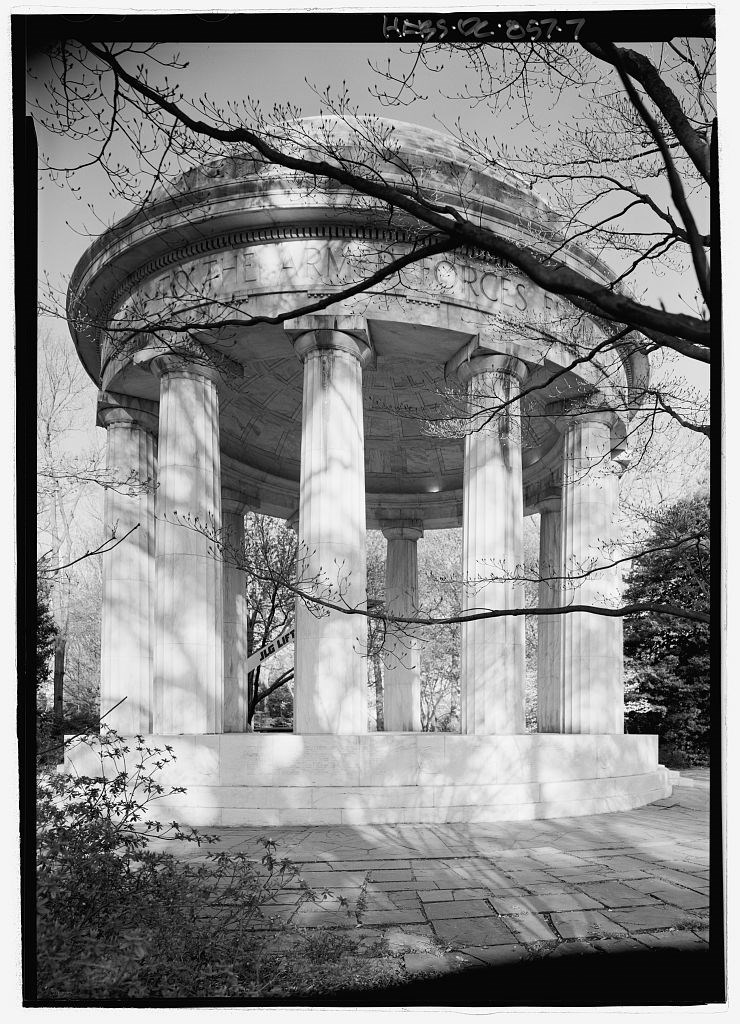975436_DC_War_Memorial2 View was photographed looking up at the structure from the turf. Tree branches with early spring buds cast a shadow on the white marble of the memorial.