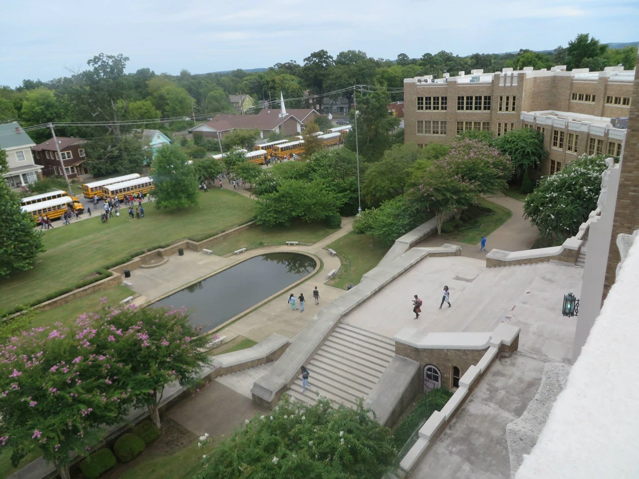 CENTRAL HS  overhead Overhead view of Central High School landscape, showing houses across the street, trees and reflecting pool, and broad staircase.