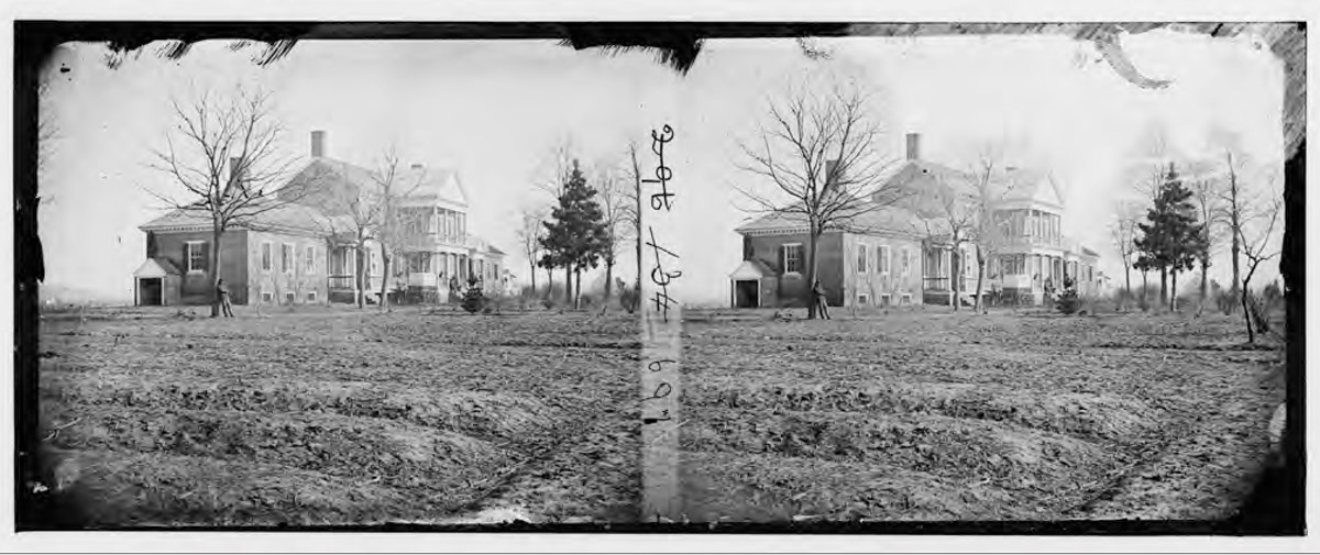 1863 photo of Chatham Manor house, surrounded by several trees and empty fields