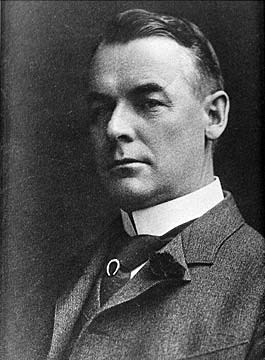 Michael J. Heney Portrait of Michael Heney, stern looking man in a suit