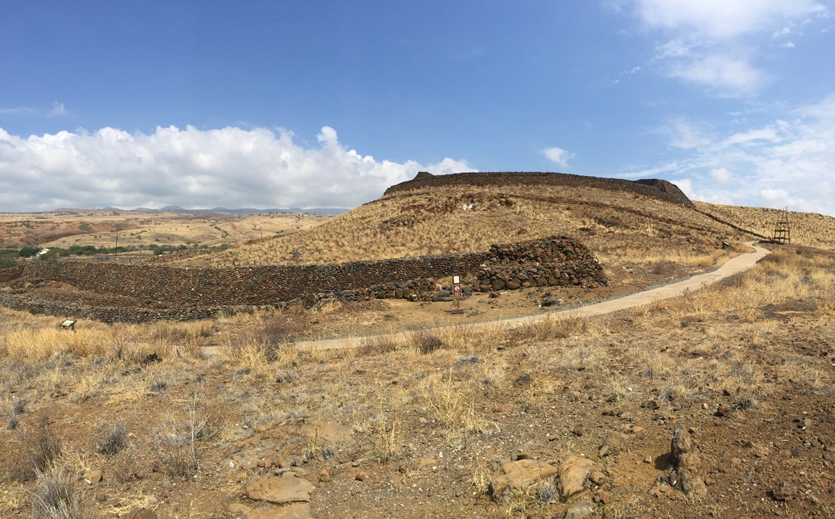A wide view of the stone walls of Mailekini Heiau and Puukohola Heiau