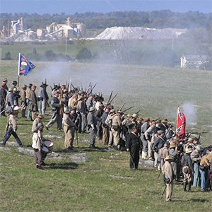 civil war reenactment with mine in background