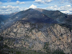 An aerial view of the Fern Lake fire shows the steep, rugged terrain in the Big Thompson drainage.