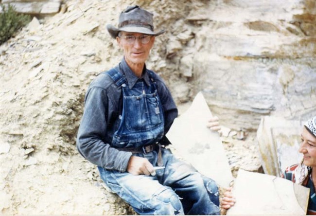 man in fossil quarry