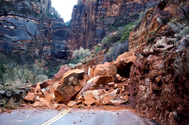 rockfall debris blocking a park road