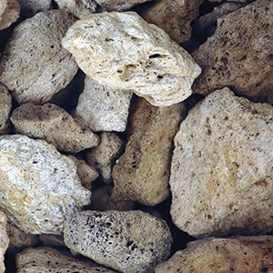 Photo of light colored rounded rocks.