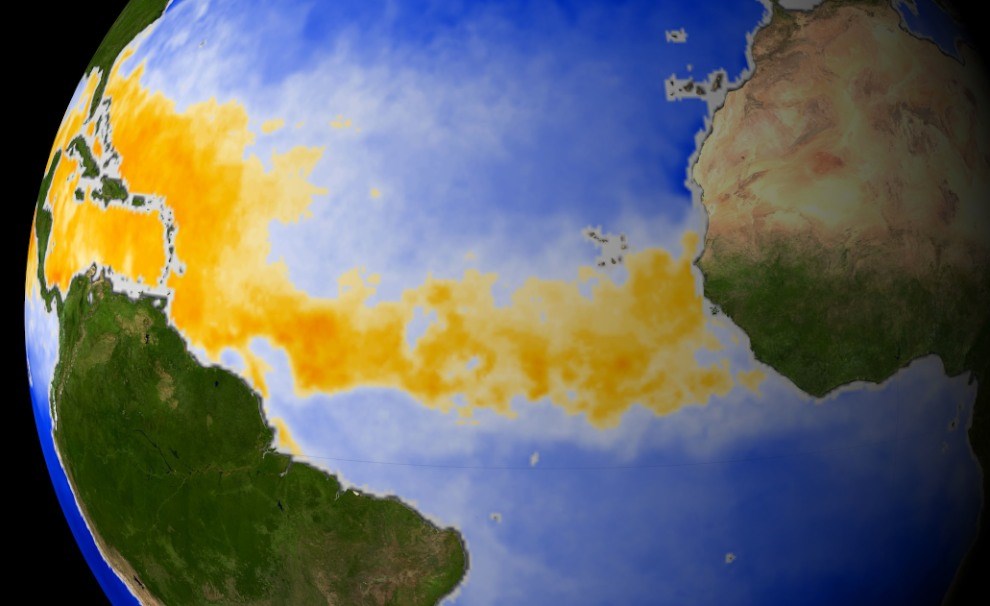 satellite image of equatorial Atlantic from Africa to Caribbean with colored band where storms develop