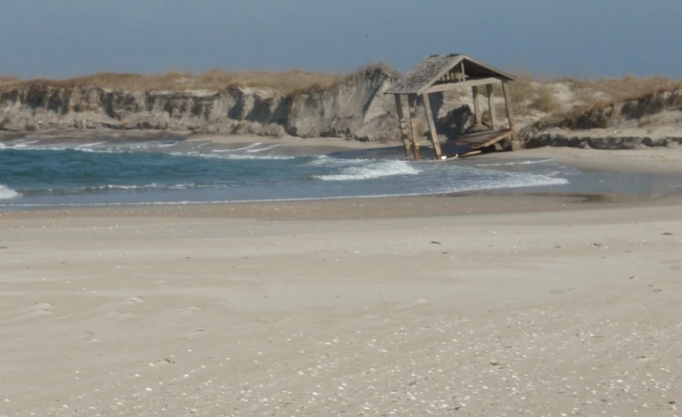 Storms_Response_Manage_H04 storm damaged shelter tipped in to waves