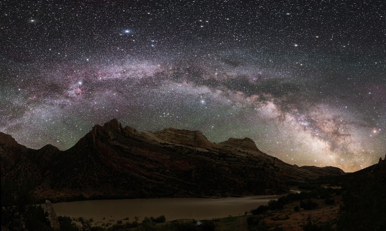 night sky, mountains, and river