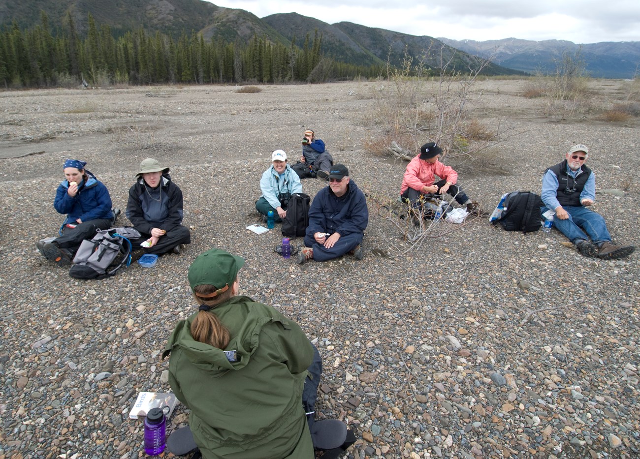 Park Ranger and a group of hikers having lunch