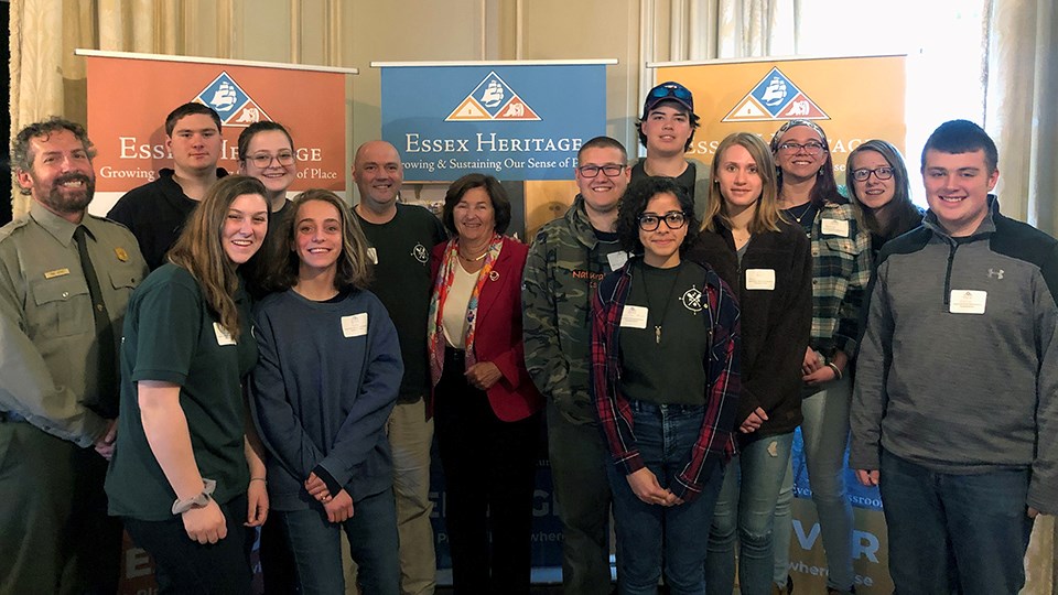 Essex North Shore Agricultural and Technical School receiving NHA grant Group of young people standing and smiling