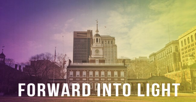 Independence Hall with a purple and gold filter over it