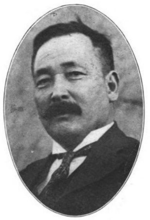 A black and white photo of George Shima
