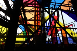 “Spectre and Shade” by Oreen Cohen Sheets of colorful plastic are installed between the rusted metal beams of the Carrie Blast Furnaces in 2015 for Oreen Cohen’s art work.