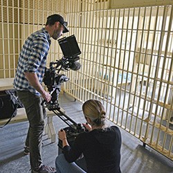 SEMO Film Shoot MLK Jail Cell Two people film a jail cell