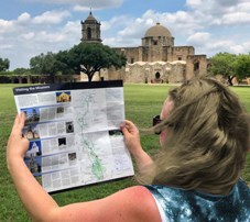 Visitor holding a park map