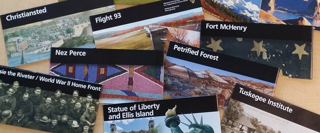 An assortment of park unigrid brochures scattered across a table.
