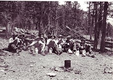 Civilian Conservation Corps (CCC) men taking a lunch break at Rocky Mountain National Park, c. 1930s. NPS Photo by George A. Grant. Civilian Conservation Corps (CCC) men taking a lunch break at Rocky Mountain National Park, c. 1930s. NPS Photo by George A. Grant.