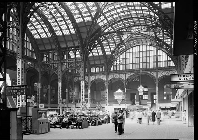 Passengers wait in Penn Station's airy concourse in 1962