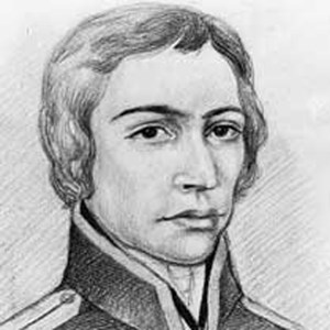 lt= Historic black and white photo of man with white hair in black jacket.