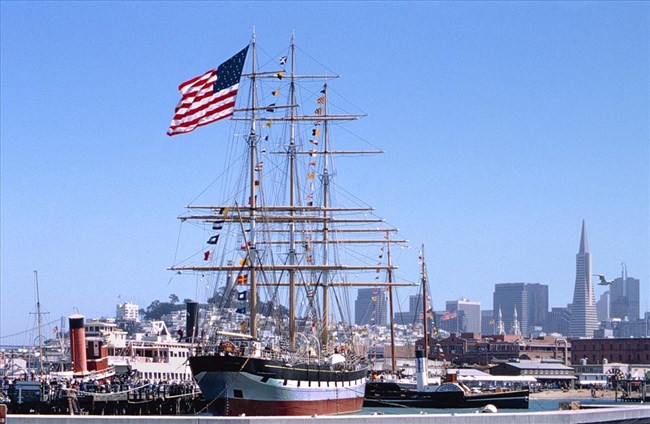 Historic vessels Balclutha, Alma, C.A. Thayer, Hercules and Eureka berthed at San Francisco Maritime National Historical Park's Hyde Street Pier.