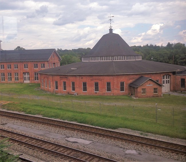 view of Baltimore & Ohio Railway Martinsburg Shops across railroad tracks