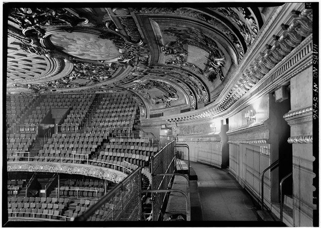 two tiers of balcony seating in interior auditorium