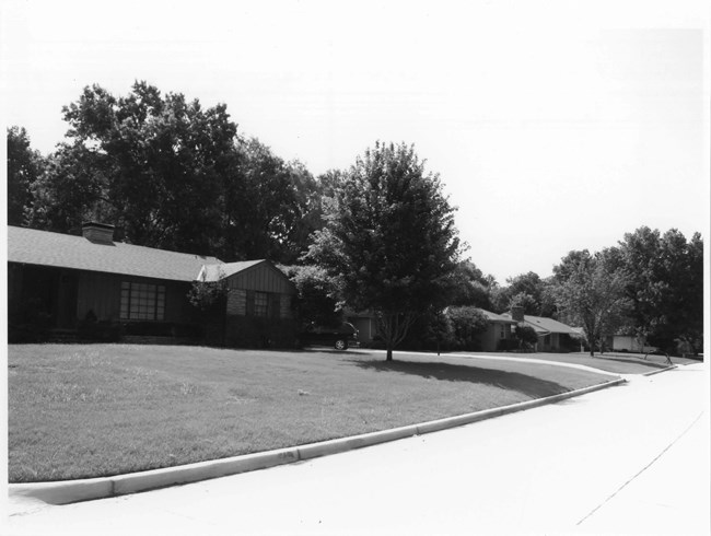Streetscape showing suburban houses