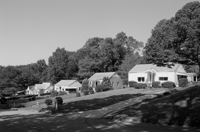 Houses set back from a street