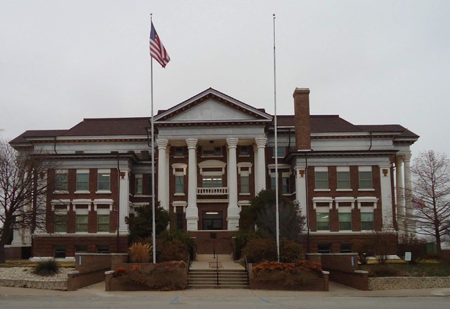 . The four-story Classical Revival brick and concrete courthouse, constructed in 1912-1913