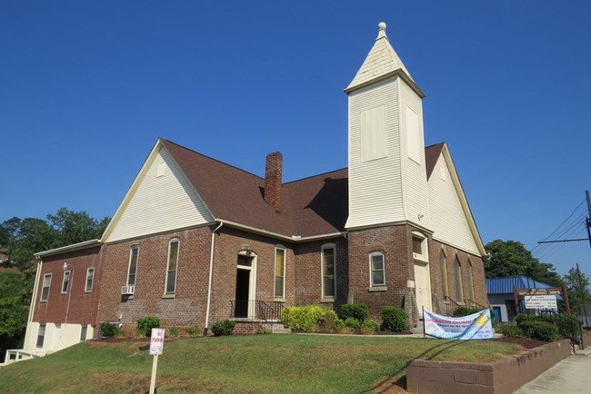 100002260-bethel-methodist-church Church with steeple on a slight hill