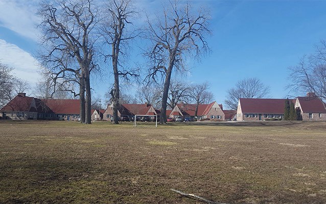 100002418 childrens village illinois soldiers and sailors childrens school Complex of buildings in open setting with playground in front.