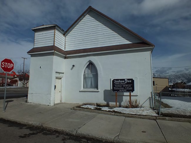 Small White chapel on street corner