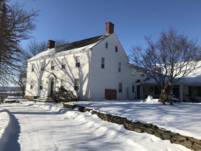 Two story five bay white frame house