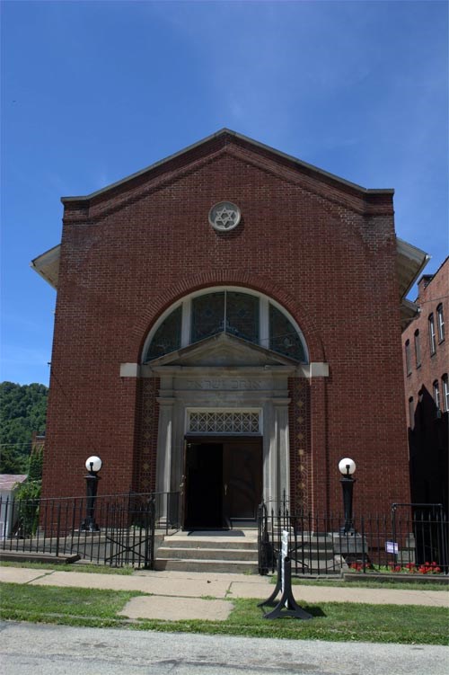 large brick temple with star of David