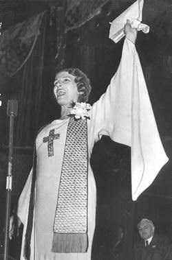 Sister Aimee Semple McPerhson preaching in 1938