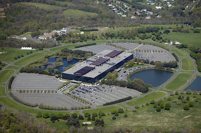 Bell Laboratories-Holmdel Image of building, roads, parking lots, lakes, and landscaping.
