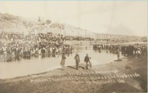 View of American's watching the Mexican Revolution from the north side of the Rio Grande River.